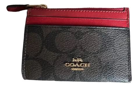 farfetch tarjeta coach.